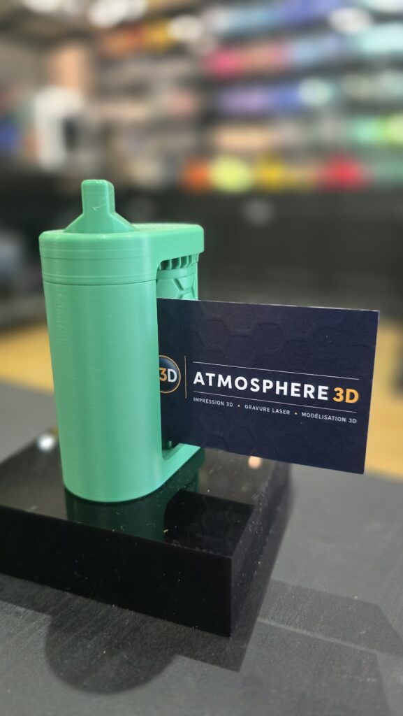 Distributeur vert à rouleaux imprimé en 3D.