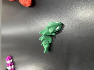Lézard articulé vert imprimé en 3D