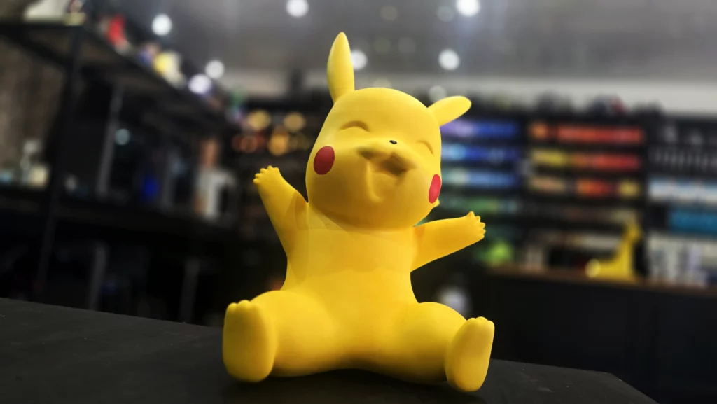 Figurine de créature jaune imprimée en 3D